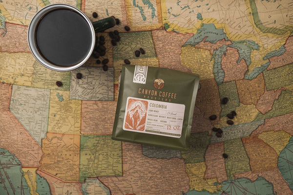 Bag of Canyon Coffee Roasters coffee on vintage U.S. map