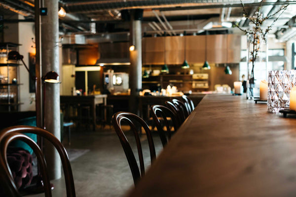 Warmly lit coffee shop seating